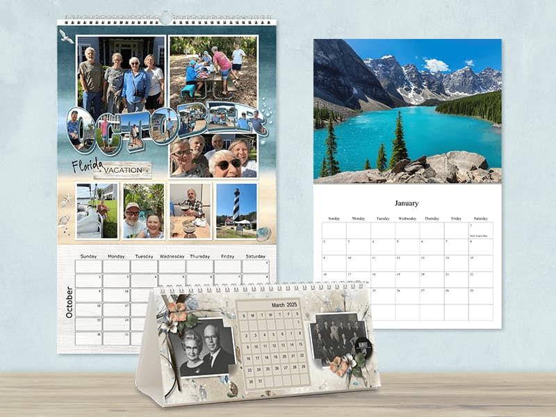 Three photo calendar styles displayed together: a wall calendar for October with 'Florida Vacation' photos, a wall calendar for January with a turquoise mountain lake photo, and a desk tent calendar for March 2025 with vintage family portraits.