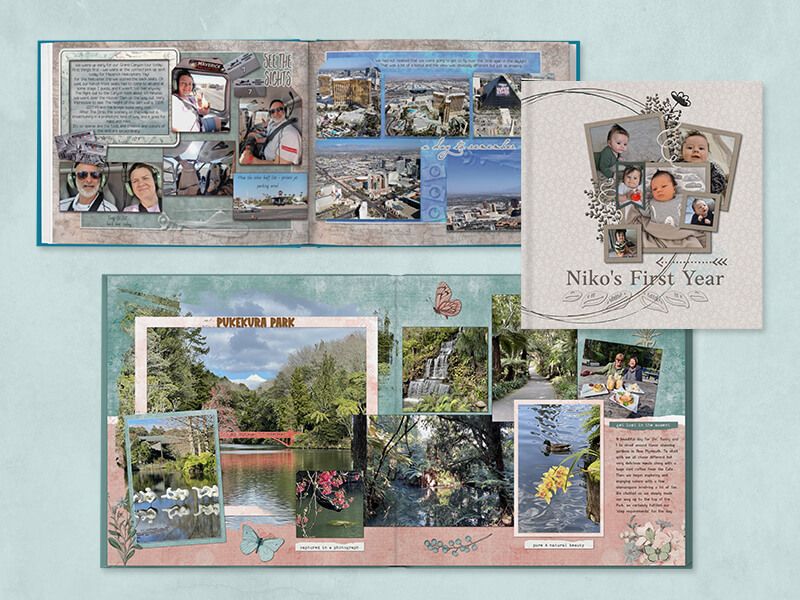 Open scrapbook spreads of travel and park photos, plus a 'Niko's First Year' baby photo collage page.