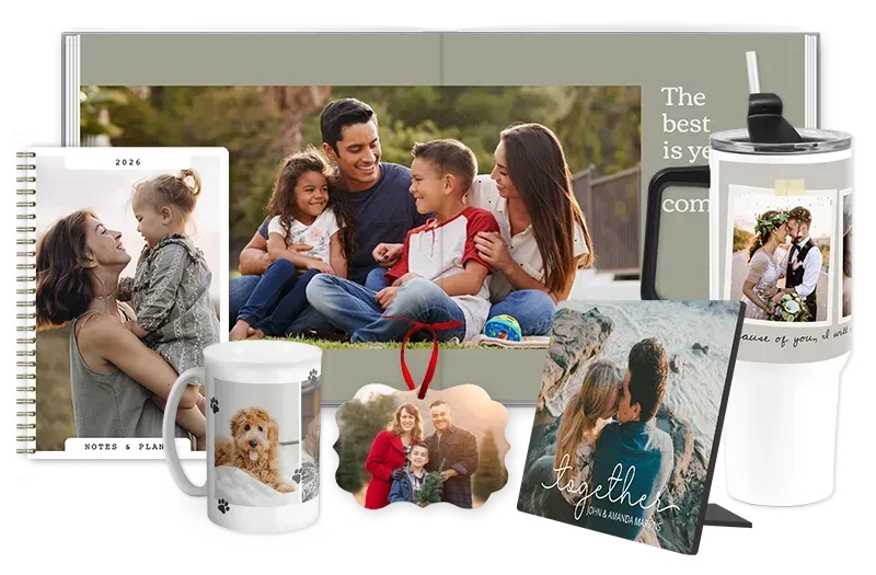 A collection of personalized photo products: an open photo book, a journal, a mug, an ornament, a tabletop panel reading 'Together,' and two photo tumblers.